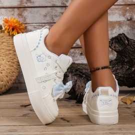 Women's Low-Top Sneakers - Lace-Up Shoes with Bow Accent, Synthetic Cover Upper & Non-Slip Rubber Sole - White & Pastel Blue Everyday Casual Shoes for Women - All-Season Fashion Footwear, Versatile Footwear, Playful Design, Comfortable Lining, Trendy Shoppers
